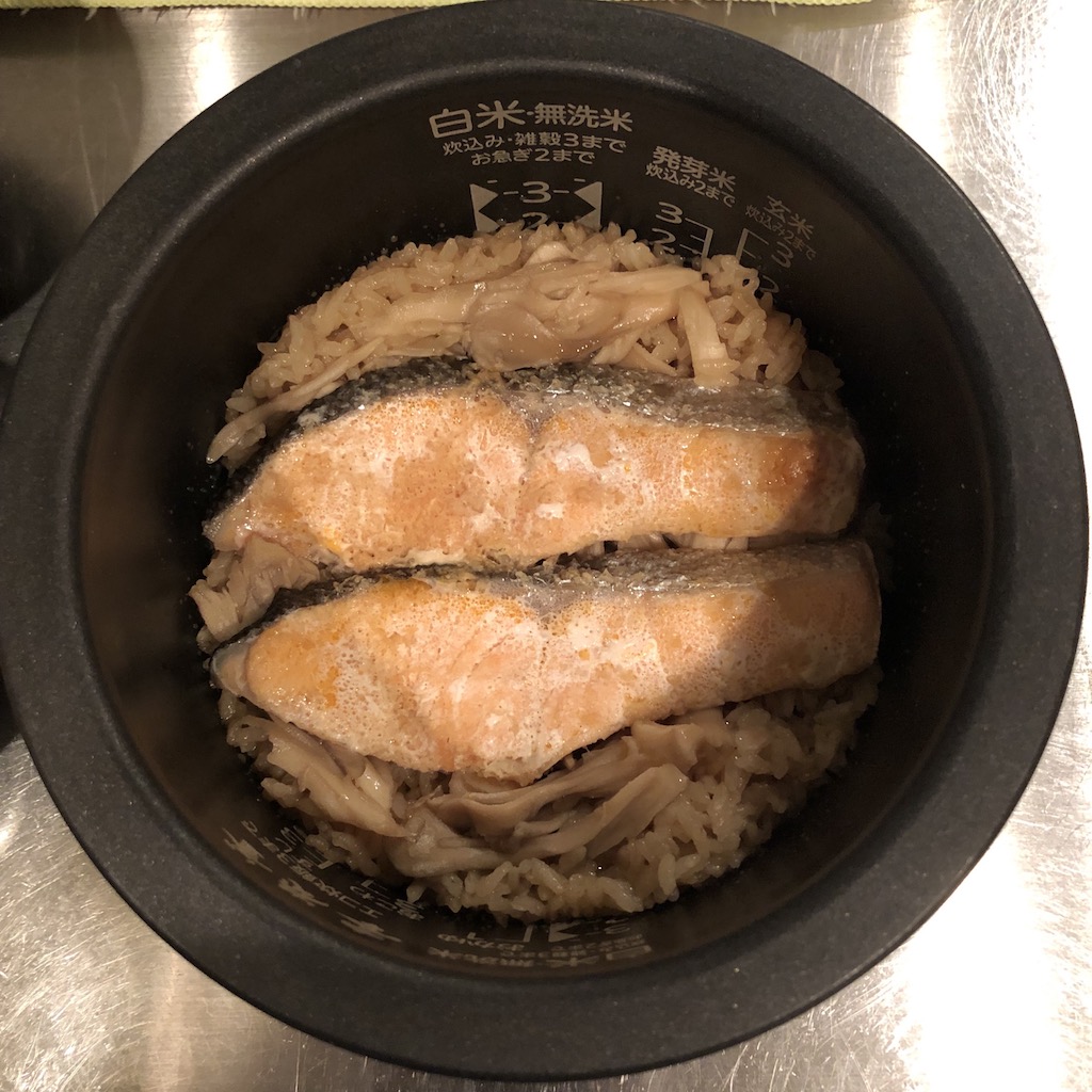 cooking salmon and rice in rice cooker